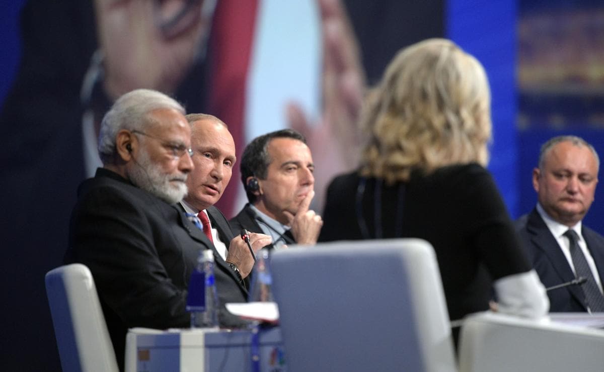 Description: Modi Putin at St Petersburg International Economic Forum plenary meeting.